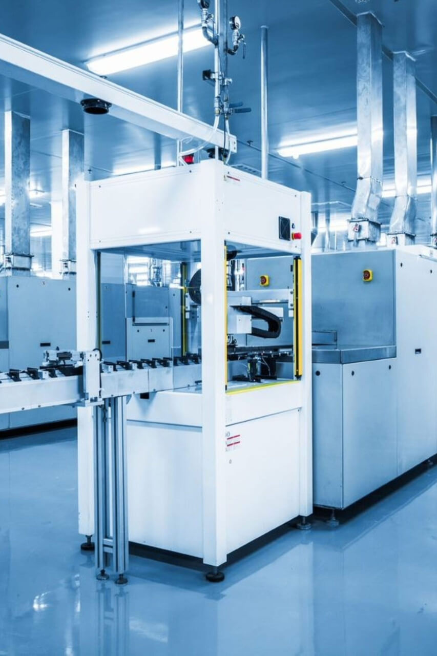 Modern industrial machinery in a clean room.